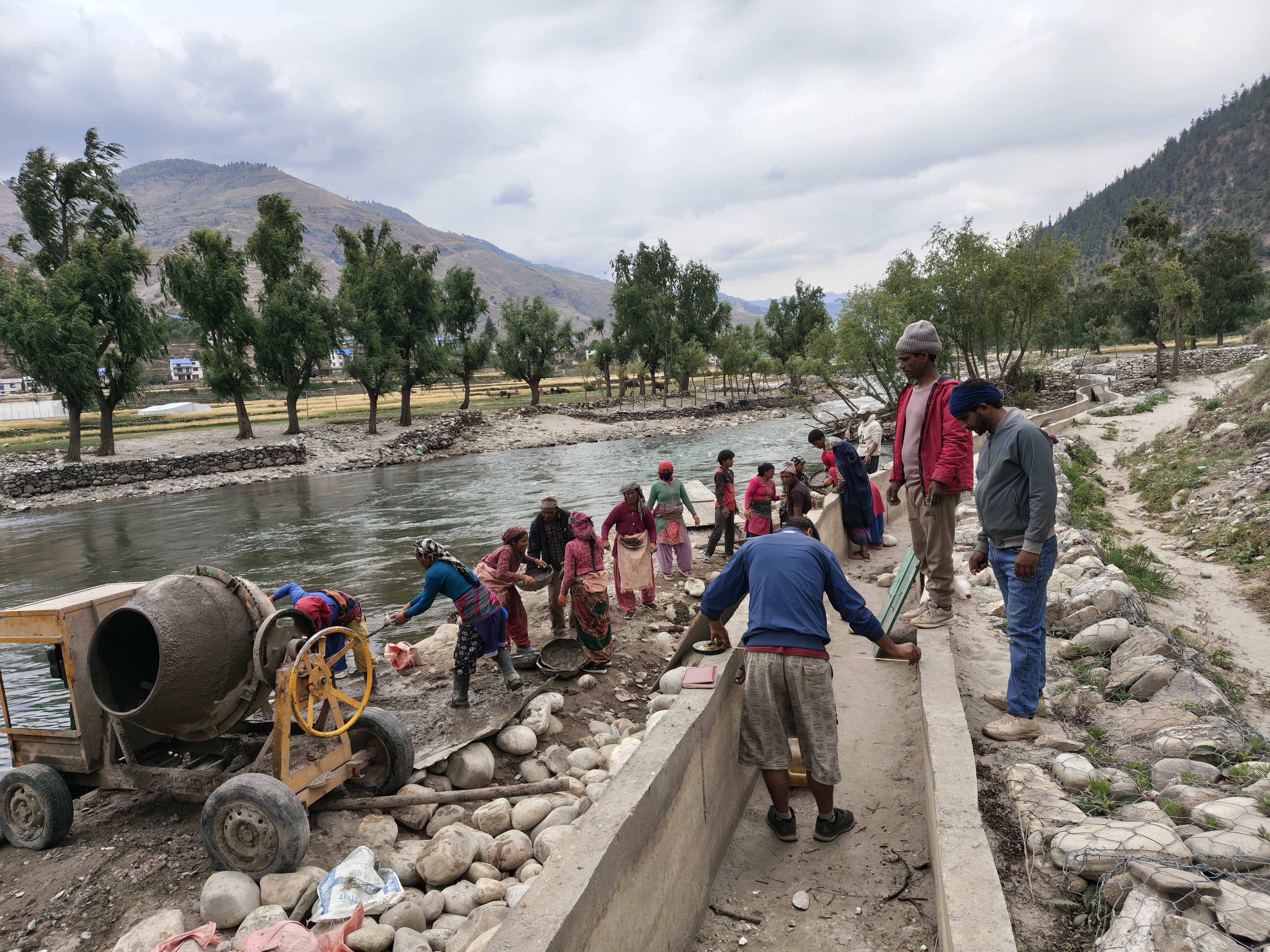 Field monitoring and discussion with local residents and workers during canal construction works in Tatopani Rural Municipality-4, Jumla